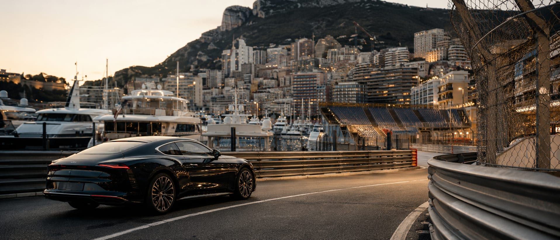 A prepared car waiting outside a Monaco hotel at dusk during Grand Prix week, the brief confirmed in writing before the keys change hands.